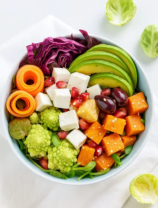 healthy-colorful-salad-bowl-modern-meal Healthy colorful salad bowl with avocado, feta, and fresh veggies