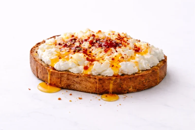 Hot honey cottage cheese toast with creamy cottage cheese and chili honey on toasted bread